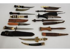 A selection of mixed daggers & knives, some faults