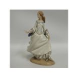 A Lladro porcelain figure of Cinderella, 9.75in ta