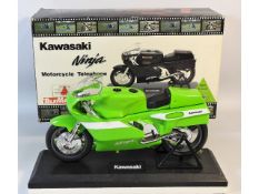 A novelty Kawasaki Ninja motorcycle telephone on p