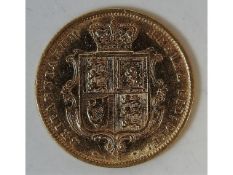 A Victorian 1874 shield back half gold sovereign,