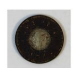 A Victorian model one penny coin