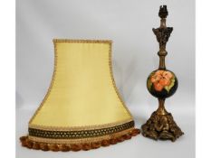 A gilded Moorcroft pottery lamp with shade