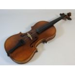 A German violin, labelled Manufactured in Berlin copy Palao Maggini, manufactured in Berlin, no bow,