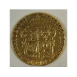 A 22ct gold George III 1785 guinea, 8.1g