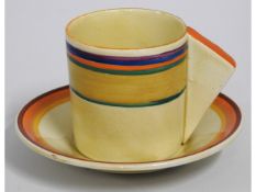 A Clarice Cliff Liberty coffee cup with Sunshine s