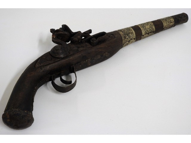 An 18th/19thC. flintlock pistol, 17.75in long