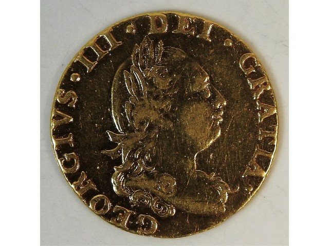 A 22ct gold George III 1785 half guinea, 4.05g