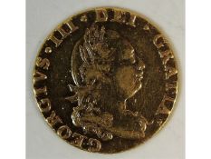 A 22ct gold George III 1785 half guinea, 4.05g