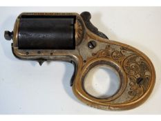 A 19thC. "My Friend" knuckleduster revolver by Jam