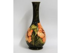 A Moorcroft pottery vase with floral decor, painte