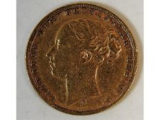 A Victorian 1877 full gold sovereign