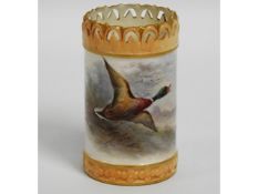 An antique Royal Worcester vase with duck in fligh