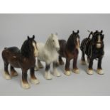 Four Beswick shire horses including grey, 8.375in