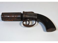 A 19thC. percussion pepperbox revolver, 8.5in long