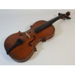 A German violin, stamped Lowendall's Celebrated Co