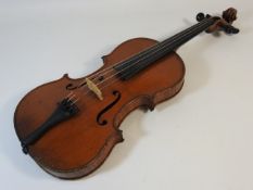 A German violin, stamped Lowendall's Celebrated Co