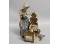 A Lladro porcelain figure group of woman, child &