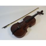 A French violin labelled Medio Fino, one piece bac