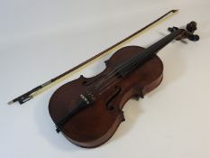 A French violin labelled Medio Fino, one piece bac