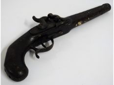 An 18th/19thC. flintlock pistol, 17.75in long