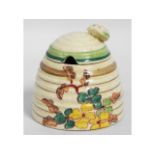 A Clarice Cliff Bizarre honey pot, 4in tall