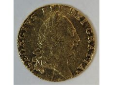 A 22ct gold George III 1788 guinea, 8.4g