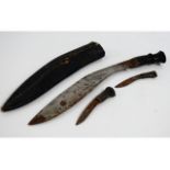 A Kukri knife with scabbard, 16.25in long