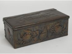 A Newlyn arts & crafts copper box with repoussé de