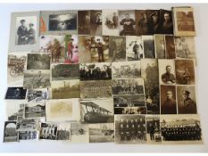 A quantity of vintage postcards covering war time,