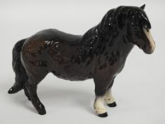A Royal Doulton Shetland pony, 5.5in tall