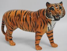 A Beswick tiger, 12.5in long x 7.5in high