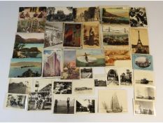 A quantity of vintage postcards including Ceylon,