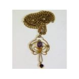 A 9ct gold Edwardian pendant comprising of amethys