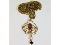 A 9ct gold Edwardian pendant comprising of amethys