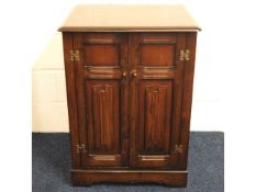 An oak entertainment cabinet, 35.5in high x 25in w