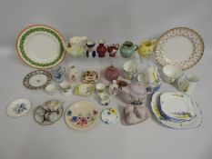 A Clarice Cliff plate, mixed china tea wares inclu