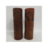A pair of Chinese carved antique bamboo brush pots