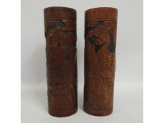 A pair of Chinese carved antique bamboo brush pots