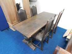 A 19thC. oak dining table with carved baluster ped