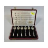 A 1962 cased set of silver tea spoons, one from ea