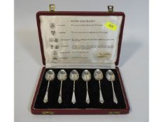 A 1962 cased set of silver tea spoons, one from ea