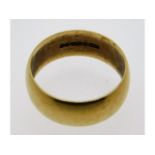 A 9ct gold band, size S/T, 5.3g