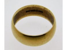 A 9ct gold band, size S/T, 5.3g