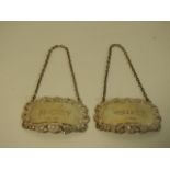 A pair of Sheffield silver sherry & whisky decante