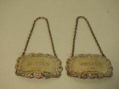 A pair of Sheffield silver sherry & whisky decante