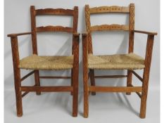 A pair of Norwegian rush seated pine carvers, 36in