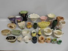 A quantity of Sylvac pottery items including vases