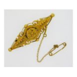 An antique 15ct gold brooch, 3.9g, 44mm wide