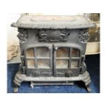 A decorative Esse cast iron log burner, 30in wide