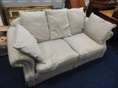 A two seater upholstered sofa, some damp staining